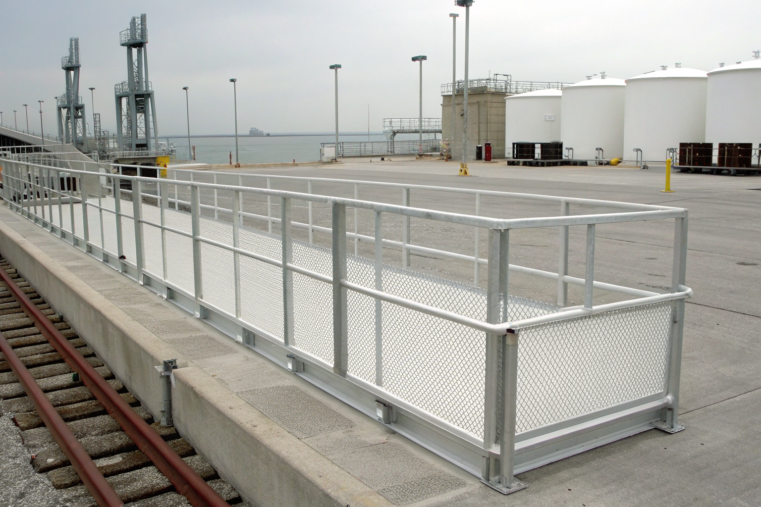 Aluminum containment system in coastal industrial setting.