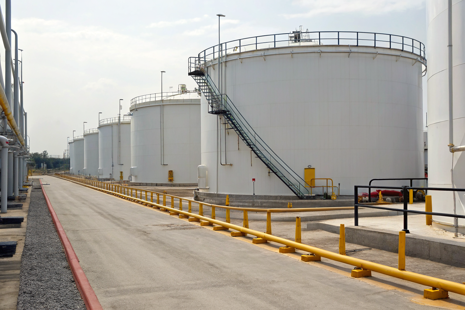 Oil storage facility showing EPA SPCC compliance signage.