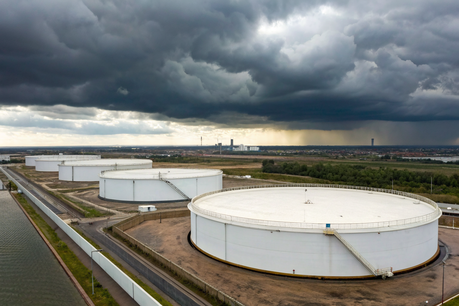 Containment area around oil tanks for spill prevention measures.