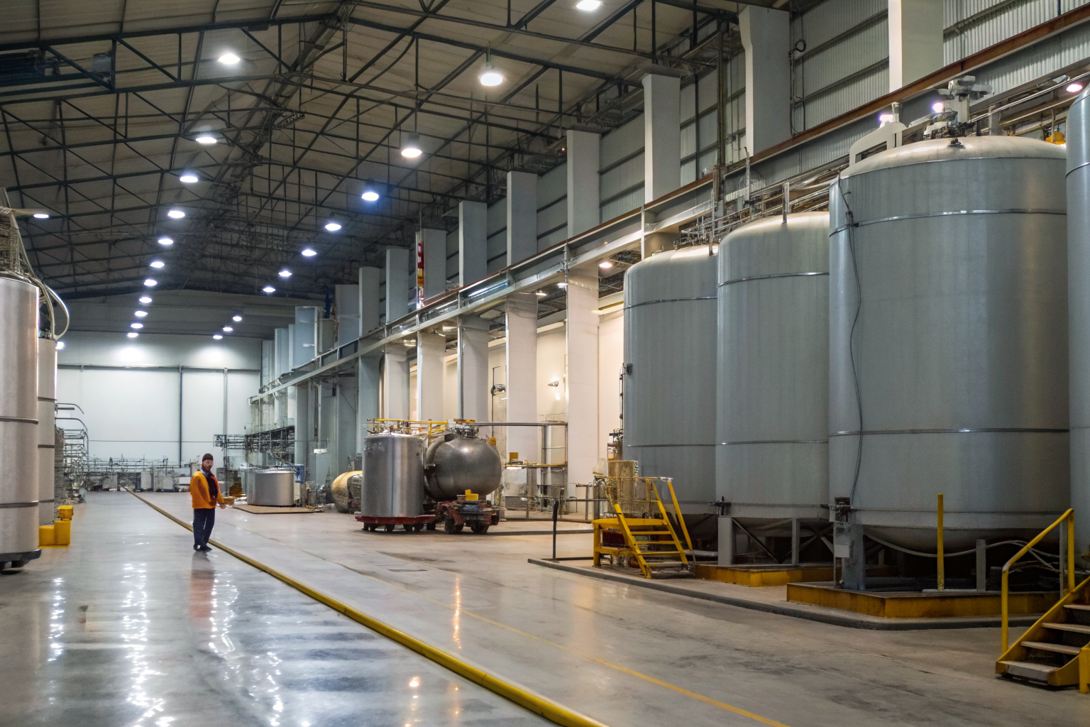 SPCC violations in a manufacturing facility with containment failures.